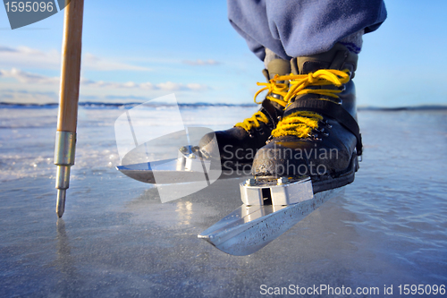 Image of ice skating on lake 