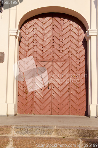 Image of Interesting old brown door.