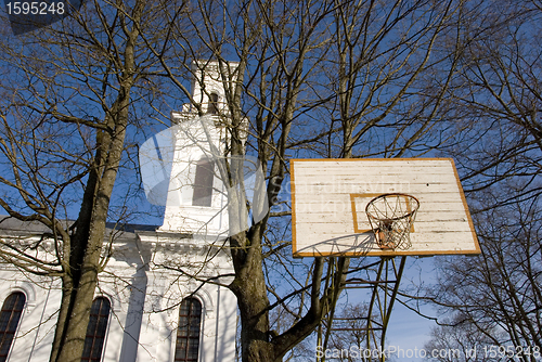 Image of Basketball yard near church.