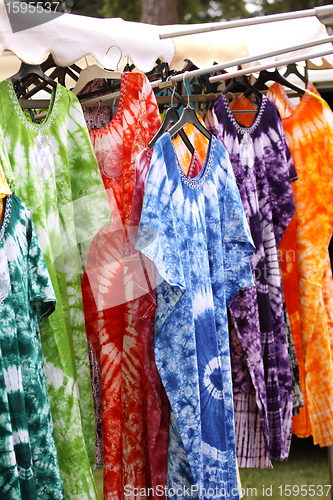 Image of African dresses colored on a market for the sale