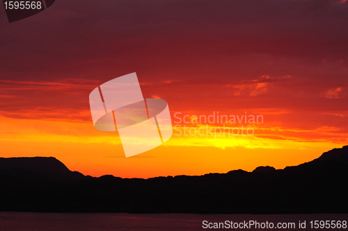 Image of sunset view from a boat off the coast of norway