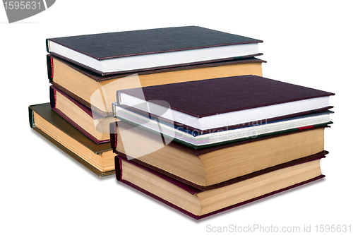 Image of Stacks of books on a white background.