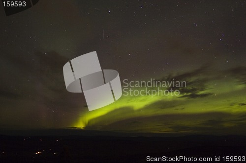 Image of Emerging aurora arc with meteor