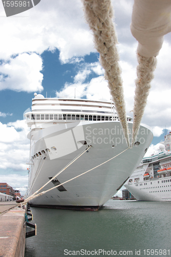 Image of front of a cruise ship docked at a port in Norway