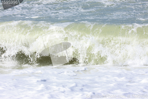 Image of wave and spray on the French Normandy coast