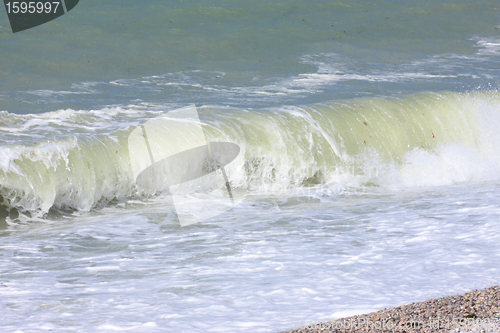 Image of wave and spray on the French Normandy coast