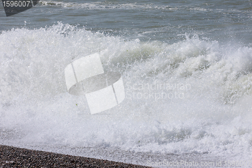 Image of wave and spray on the French Normandy coast