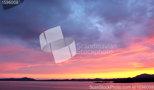 Image of sunset view from a boat off the coast of norway