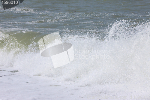 Image of wave and spray on the French Normandy coast