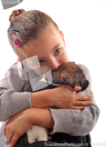 Image of child and puppy