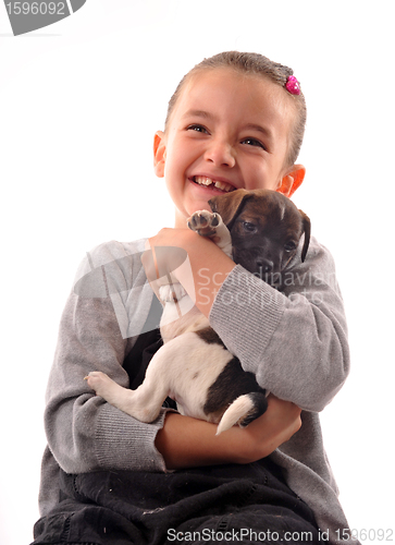 Image of child and puppy