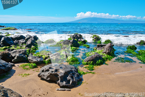 Image of Rocks, and Pacific ocean waves on the island of Maui