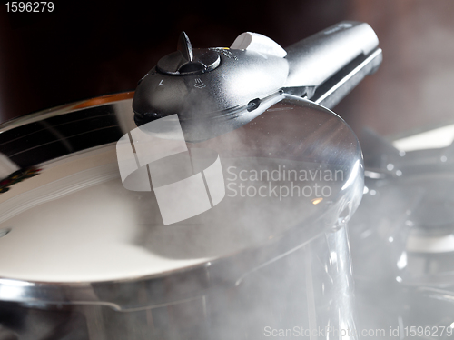 Image of Steam escaping from new pressure cooker pot