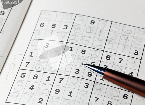 Image of Pencil resting on sudoku book
