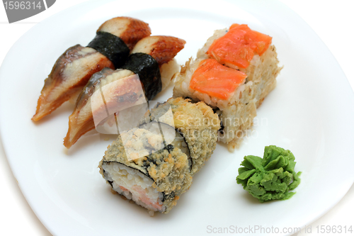 Image of rolls and sushi on plate