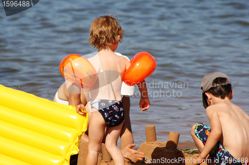 Image of children playing in the sand