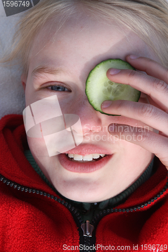 Image of child and cucumber