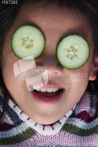 Image of child and cucumber