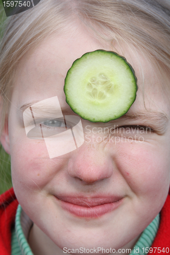 Image of child and cucumber