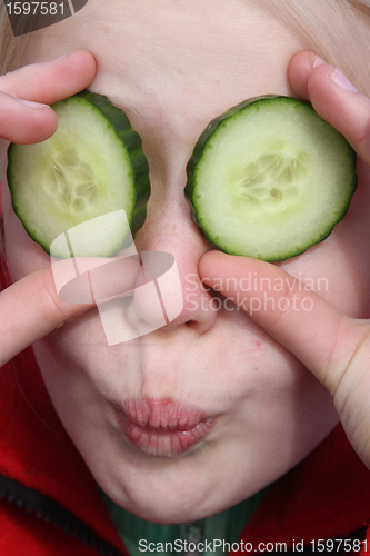 Image of child and cucumber