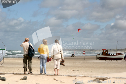 Image of tourists on the beach