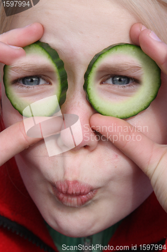 Image of child and cucumber