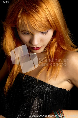 Image of dark redhead portrait