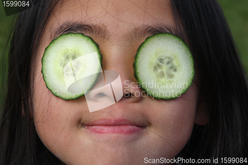 Image of child and cucumber