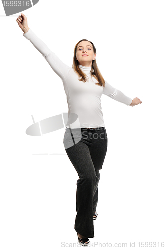 Image of Young beautiful woman stands