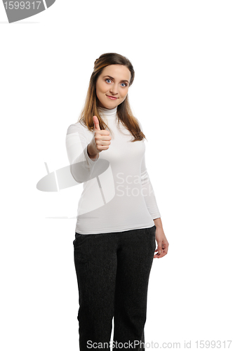 Image of Young beautiful woman thumbs up