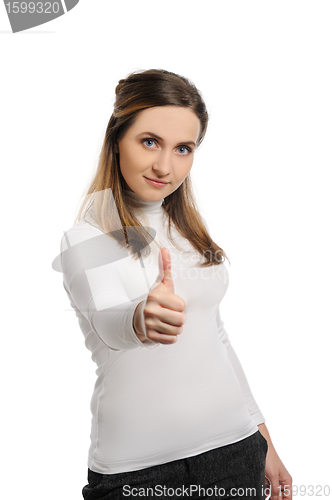 Image of Young beautiful woman thumbs up