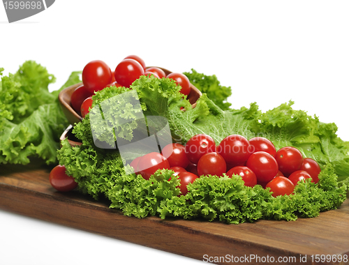 Image of Tomatoes And Salad Leaves