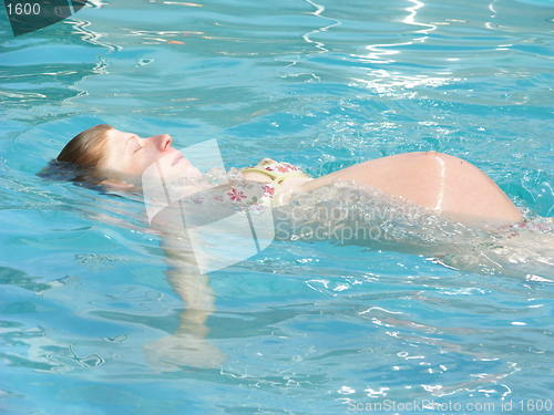 Image of Pregnant Woman Swimming