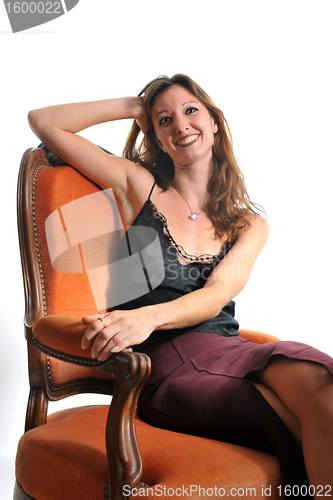 Image of woman on armchair