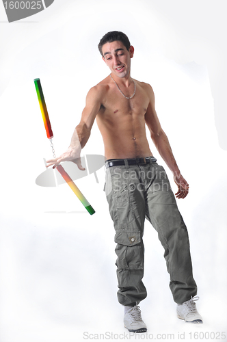 Image of man with nunchaku