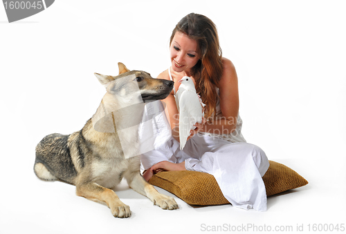 Image of woman, wolf and dove