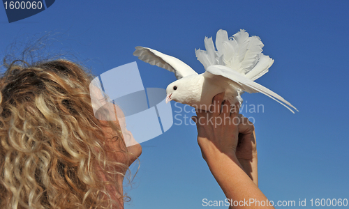 Image of dove and blond girl