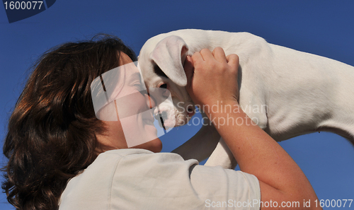 Image of young woman and puppy