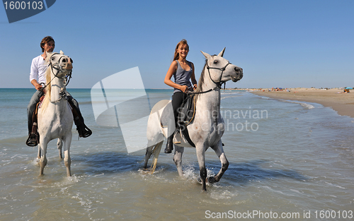 Image of horseback riding on the beach