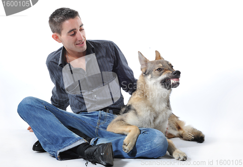 Image of man and angry wolf