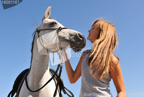 Image of child and young horse