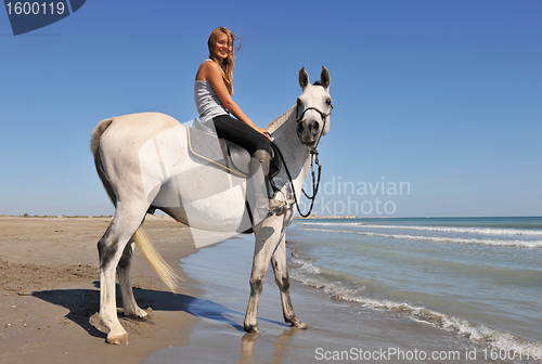 Image of smiling riding girl