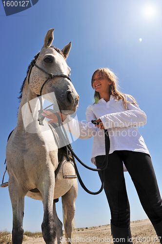 Image of teen and horse