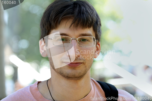 Image of Handsome young man with glasses