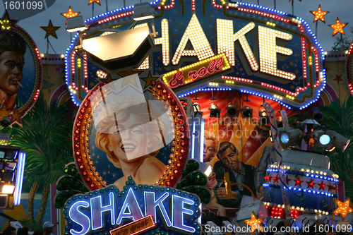 Image of fun fair attraction advertising