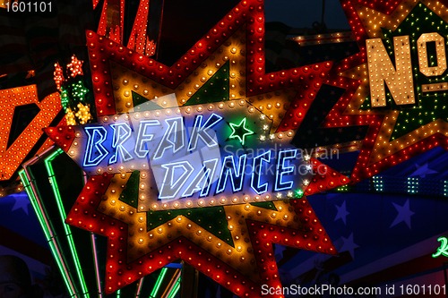 Image of fun fair attraction advertising