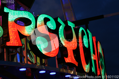 Image of fun fair attraction advertising