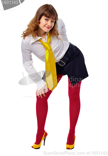 Image of Young girl in red stockings and a yellow shoes