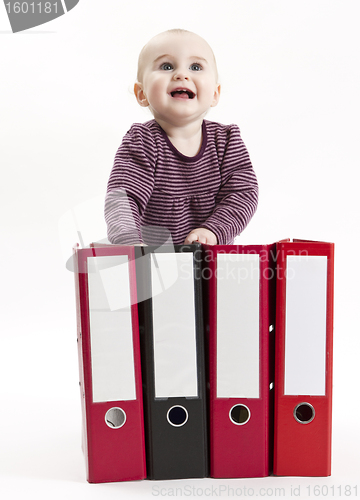 Image of young child with ring file