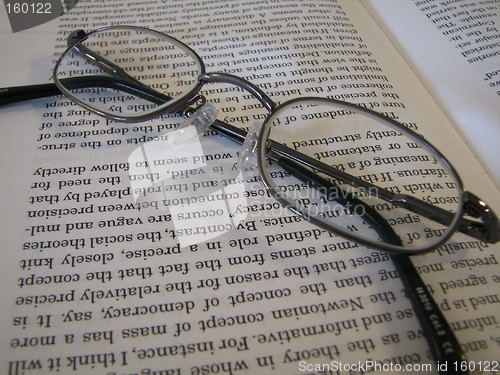 Image of Glasses on a book